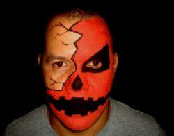 Maquillaje halloween calabaza cara mitad